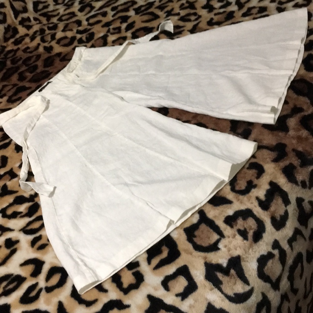 Gently used white Moda International goucho pants